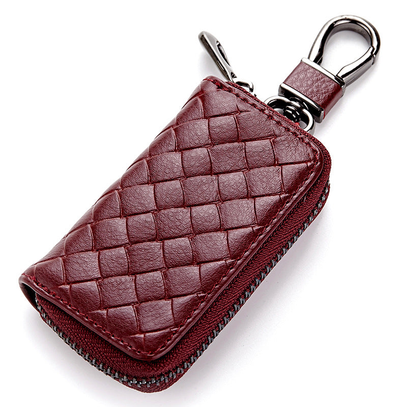 Woven leather car key holder – burgundy version with metal clasp on white background
