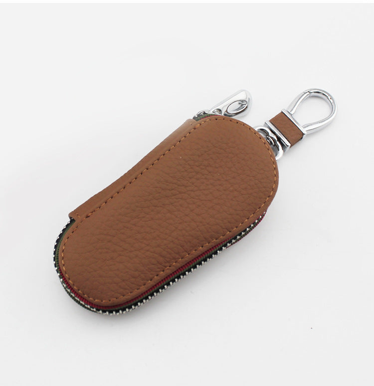 Leather zip car key case – universal – tan case shown closed with clip visible