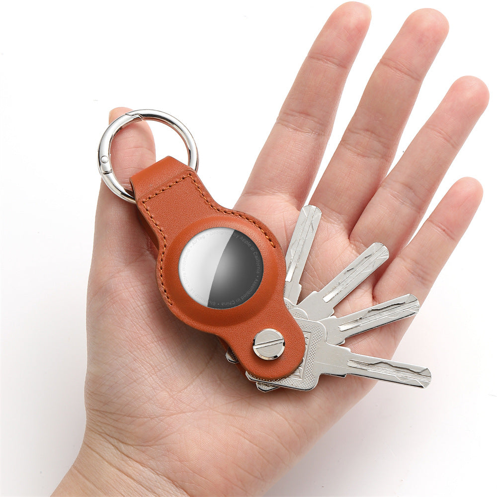 Leather key fob holster with keyring clip – held in palm with keys attached
