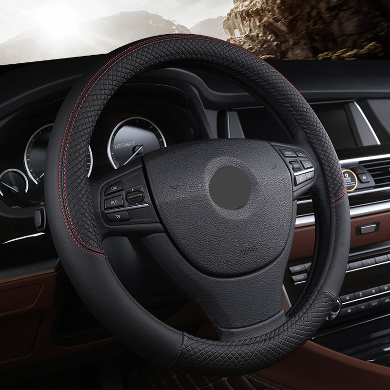 Leather-look steering wheel cover, 38cm – fitted on car steering wheel in black with red stitching