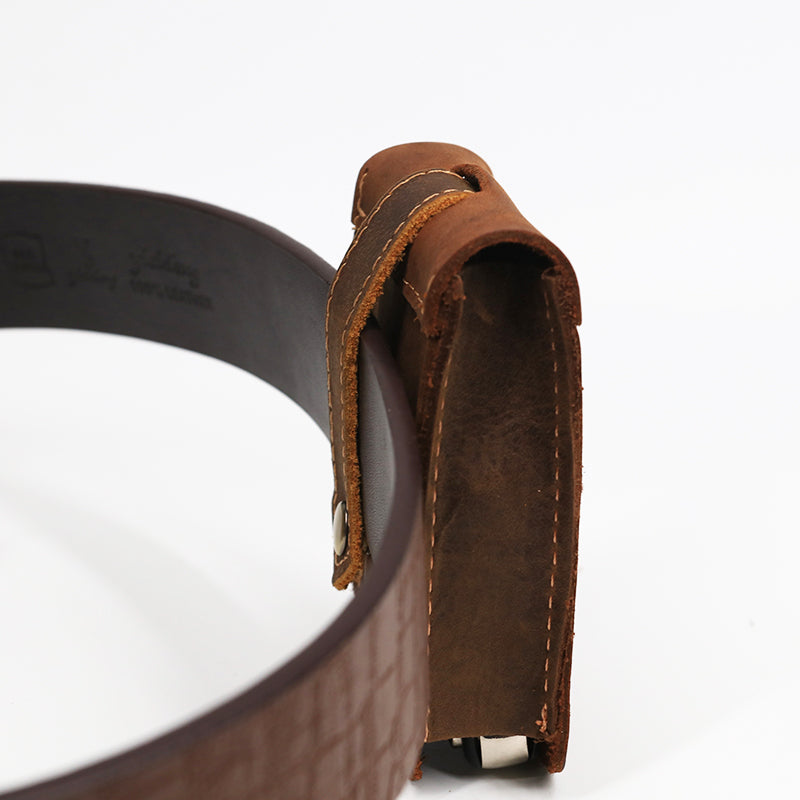 Vintage leather car key pouch – brown – pouch attached to belt loop, side view