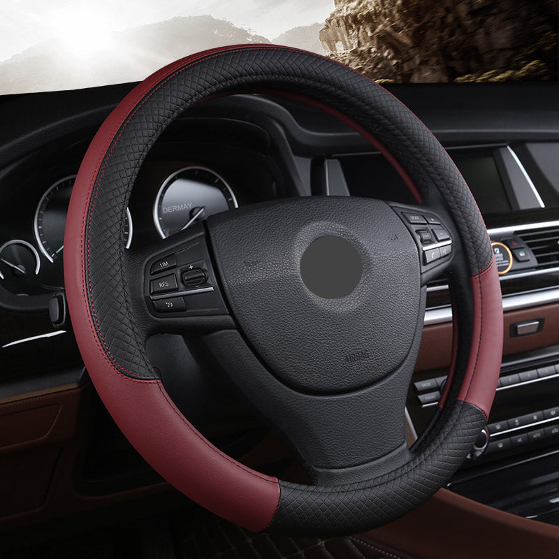 Leather-look steering wheel cover, 38cm – fitted on car steering wheel in maroon and black