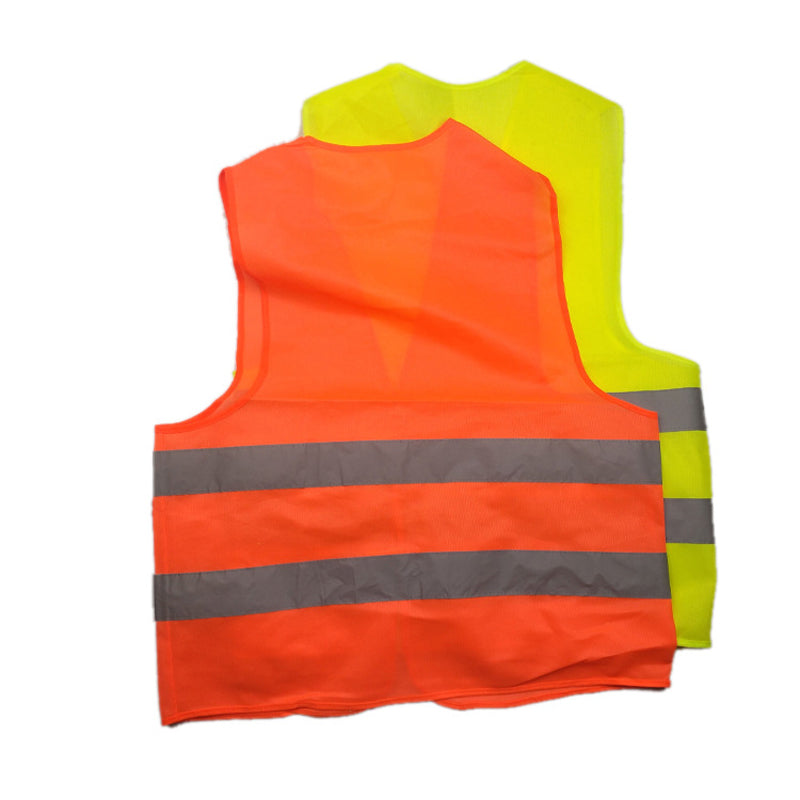 High-visibility yellow reflective safety vest – yellow and orange vests laid flat, back view