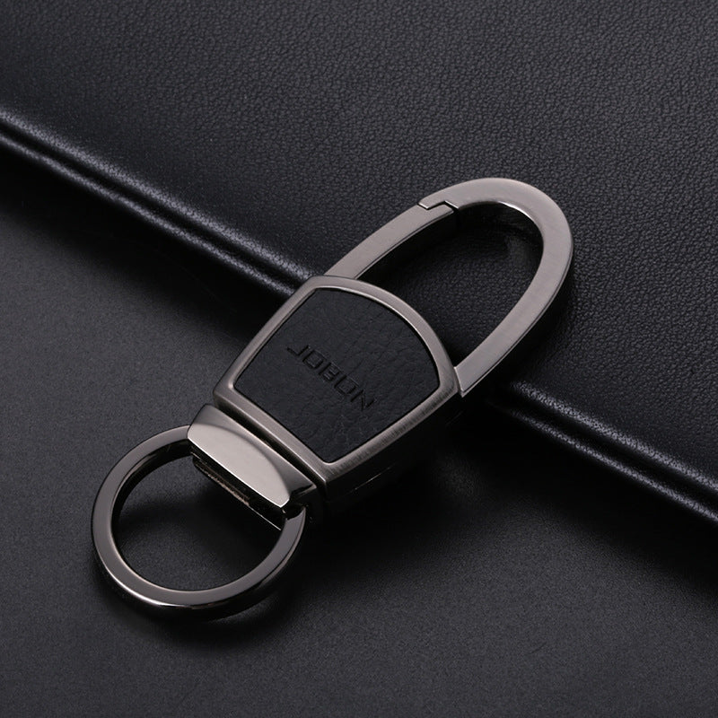 Metal chain car keyring – gunmetal keyring with black leather panel close-up