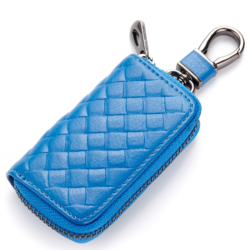 Woven leather car key holder – blue version with metal clasp on white background