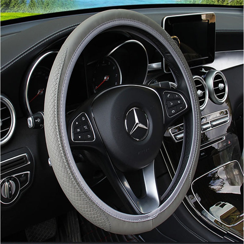Two-tone fibre leather steering wheel cover – grey cover fitted on a Mercedes steering wheel