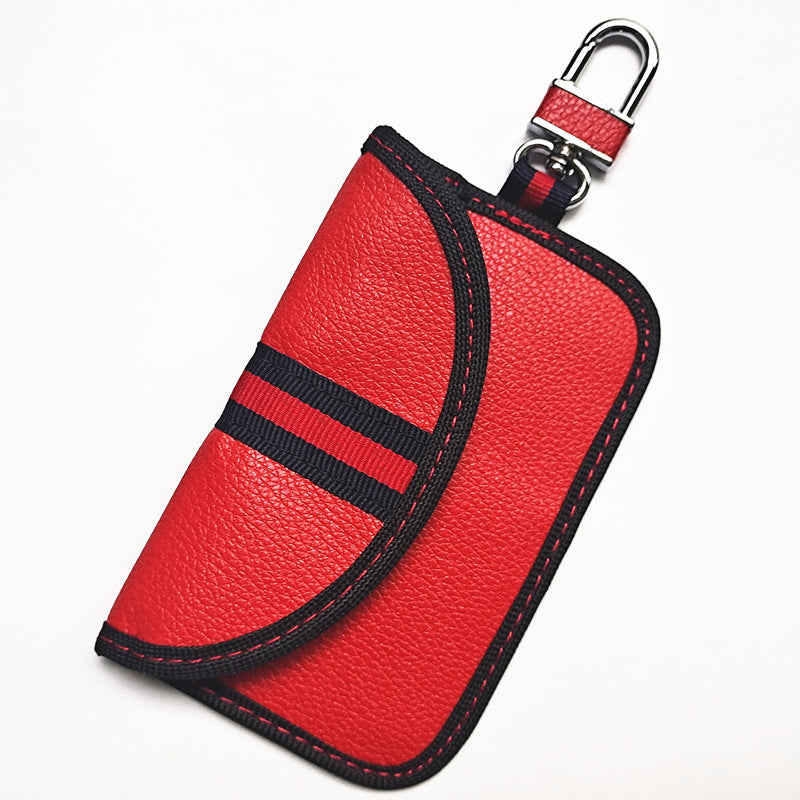 RFID signal-blocking car key case – leather or carbon-look – close-up of red leather case