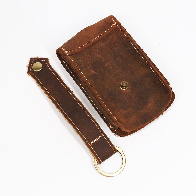 Vintage leather car key pouch – brown – open pouch beside detached wrist strap with ring