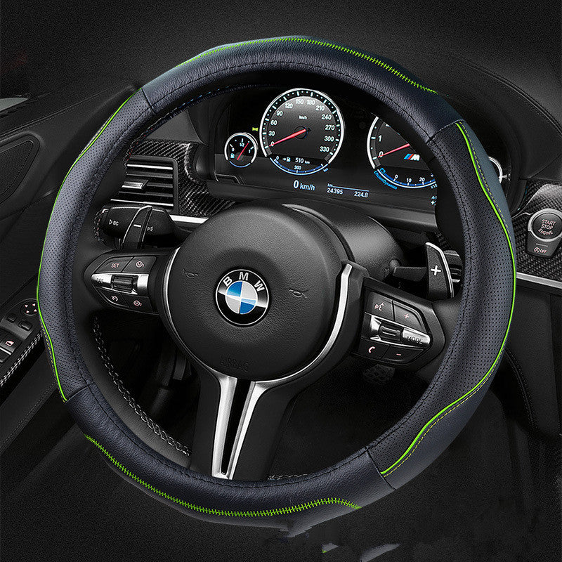 Soft-grip steering wheel cover, 36cm or 38cm – black cover with green stitching on a BMW steering wheel