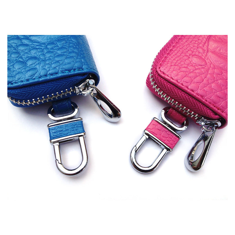 Crocodile-pattern leather car key case – universal – close-up of zip pull and clip hardware