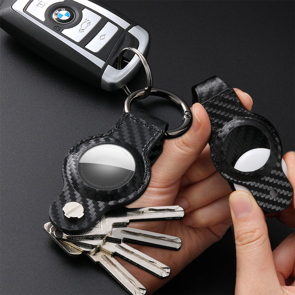 Leather key fob holster with keyring clip – held in hand with bmw key fob and keys