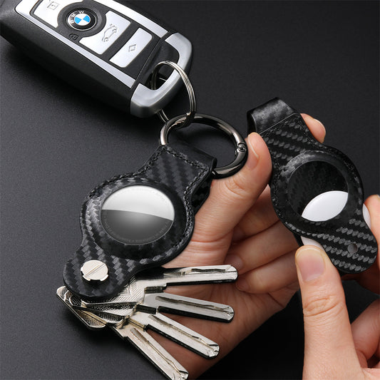 Leather key fob holster with keyring clip – held in hand with bmw key fob and keys