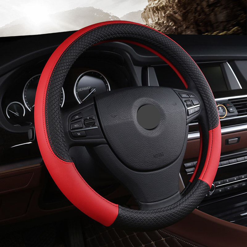 Leather-look steering wheel cover, 38cm – fitted on car steering wheel in red and black