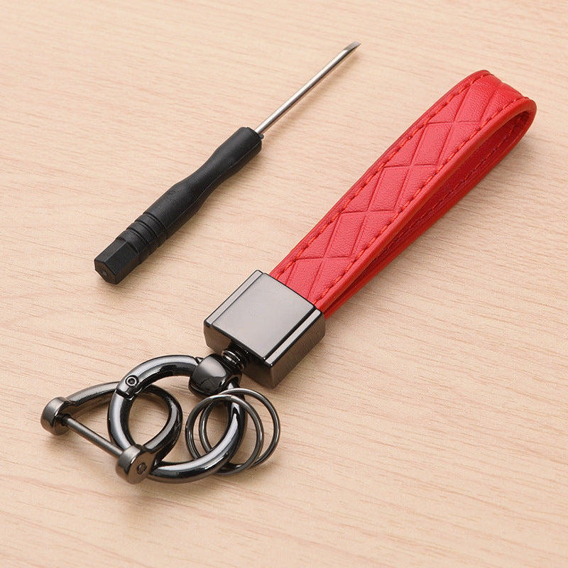 Metal car keyring with lanyard loop – red version shown with screwdriver tool