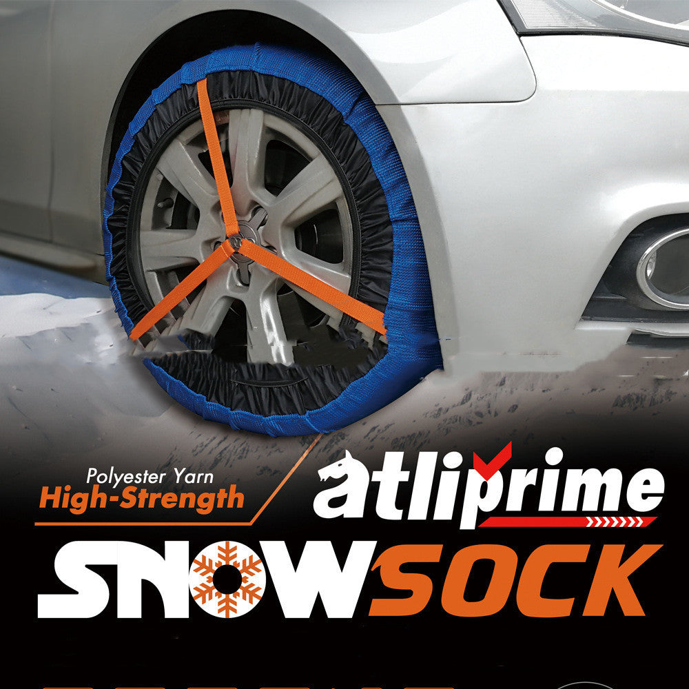 Textile snow sock for car tyres – close-up of fitted sock on front wheel