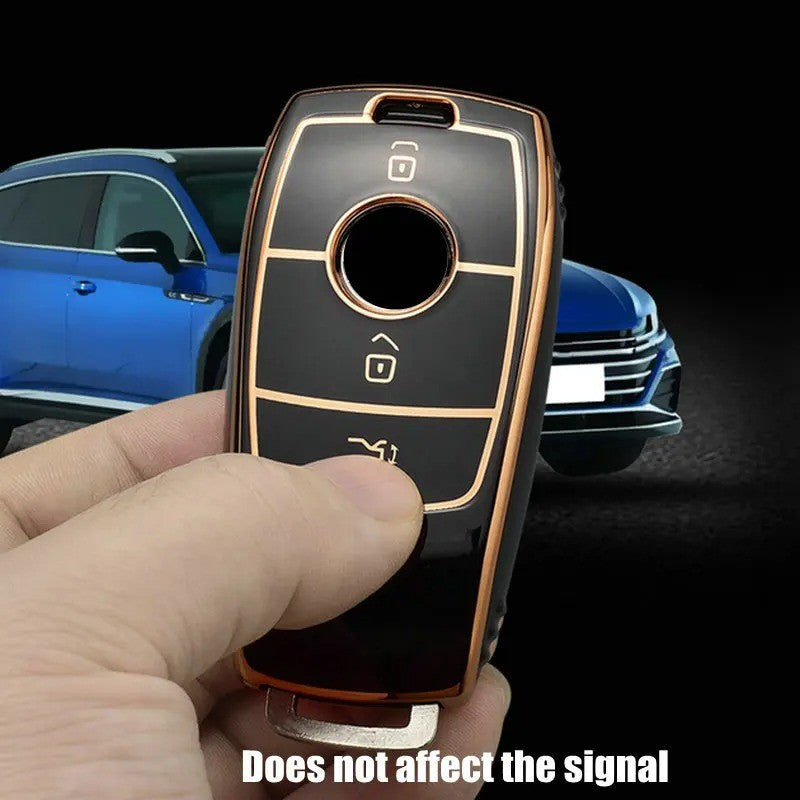 Key fob cover for Mercedes-Benz smart keys – TPU – held in hand showing fit with car in background